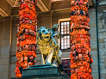 Detail of the installation of Ai Weiwei. The columns of the Konzerthaus Berlin full of lifejackets. 2016
